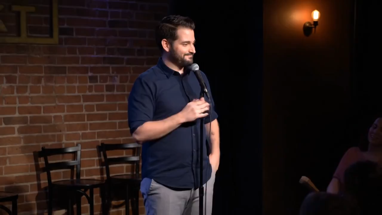 A man doing stand up comedy
